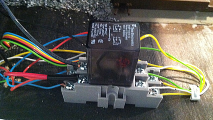 Photo of an electrical relay that operates an O scale crossing gate on the layout