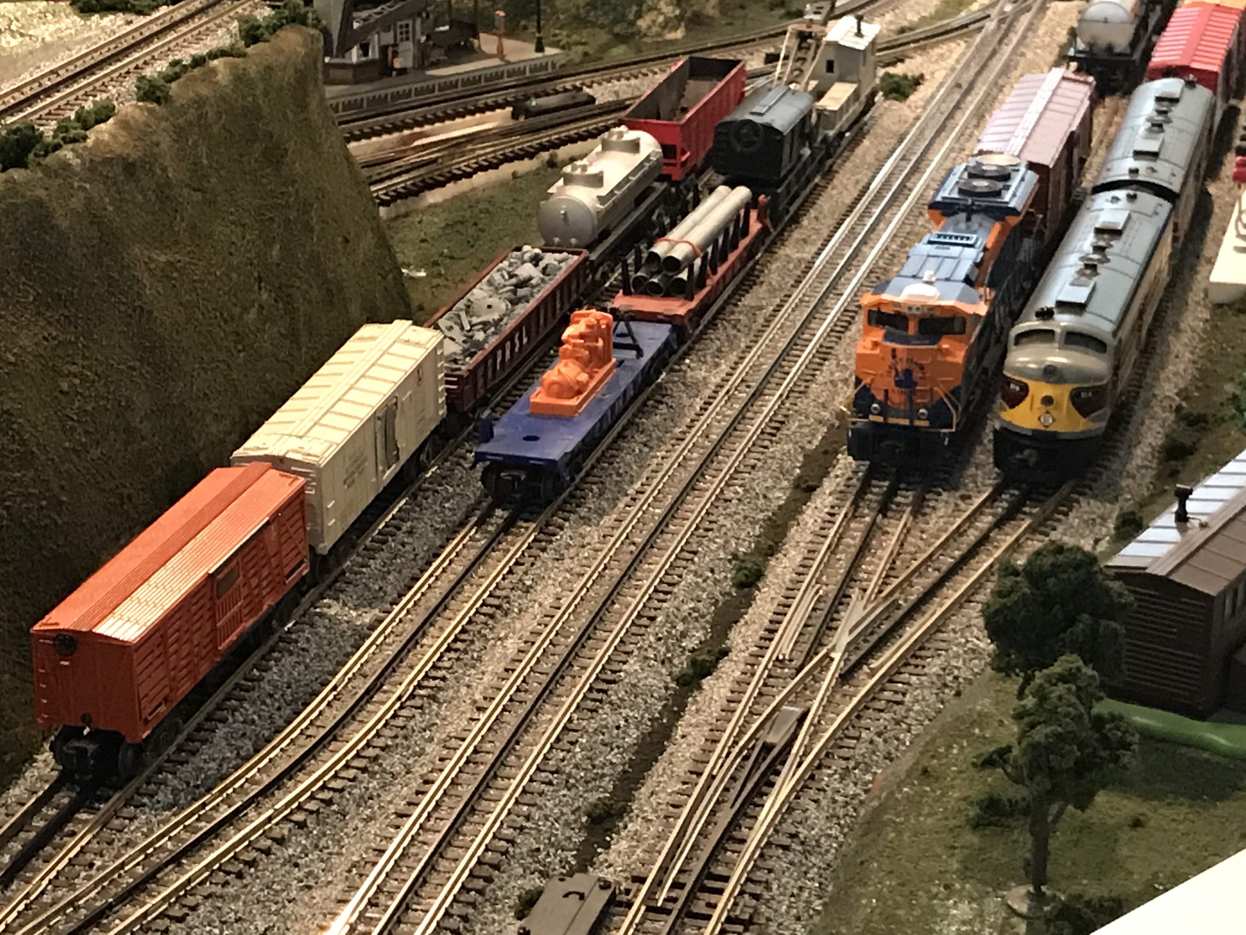 Layout photo showing the freight yard, with locomotives and freight cars in the sidings